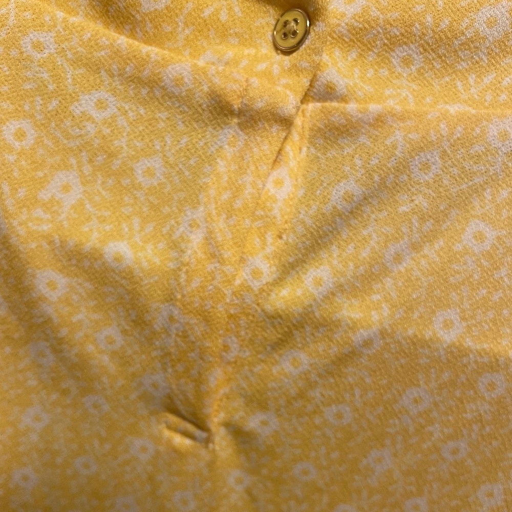 Feminine, frilly Yellow sleeveless high neck blouse